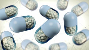 Colorful abstract chaotic structure balls inside the capsule, pharmacy and medical concept isolated on white background stock footage Colorful abstract chaotic structure balls inside the capsule, pharmacy and medical concept isolated on white background stock footage