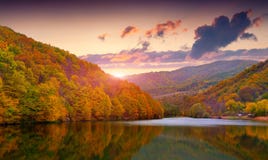 Colorful autumn landscape in mountain lake stock images Colorful autumn landscape in mountain lake stock images