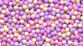 Colorful balls background. Pile of soft bright balls in pastel colors