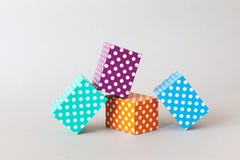 Colorful blocks polka dot pattern. Violet green orange blue color rectangular abstract boxes arranged on gray background royalty free stock photos Colorful blocks polka dot pattern. Violet green orange blue color rectangular abstract boxes arranged on gray background royalty free stock photos