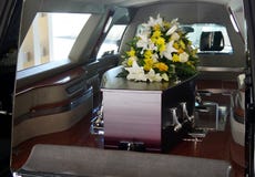 a colorful casket in a hearse or church before funeral