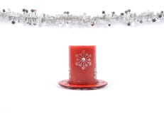 Christmas garland and candle on white Royalty Free Stock Image Christmas garland and candle on white Royalty Free Stock Image