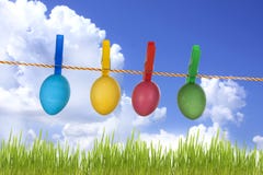 Colorful easter eggs on blue sky