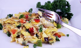 Colorful Egg Omelet With Fork Stock Photo