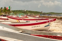 Colorful fishermen boats on Playa Tulum. royalty free stock photography Colorful fishermen boats on Playa Tulum. royalty free stock photography