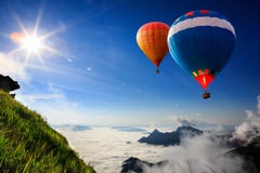 Colorful Hot-air Balloons Flying Over The Mountain Royalty Free Stock Image
