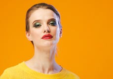 Colorful makeup woman red lips in yellow clothes on color happy summer fashion background manicured nails royalty free stock image Colorful makeup woman red lips in yellow clothes on color happy summer fashion background manicured nails royalty free stock image