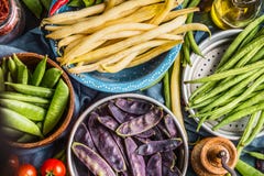 Colorful pea and bean pods in bowls, top view, close up. Healthy vegetarian food royalty free stock photo Colorful pea and bean pods in bowls, top view, close up. Healthy vegetarian food royalty free stock photo