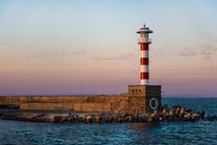 Colorful sunset over the lighthouse of the Bourgas sea shore Stock Photos Colorful sunset over the lighthouse of the Bourgas sea shore Stock Photos