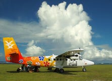 Colorful airplane at paradise island. Sunny morning