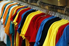 Colorful Tshirts On Rack Stock Images