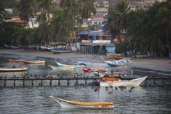 Colorful Wooden Fisher Boats Anchored In The Bay Of Pampatar Wit Royalty Free Stock Images