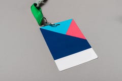 Colour badge mockup on gray background. Plain empty name tag mock up with colour string royalty free stock image Colour badge mockup on gray background. Plain empty name tag mock up with colour string royalty free stock image