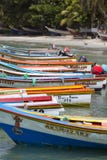 Colourful Wooden Fisher Boats Aligned On The Beach, Margarita Is Stock Image