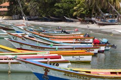 Colourful Wooden Fisher Boats Aligned On The Beach, Margarita Is Royalty Free Stock Photos