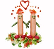 Comida vegetal creativa de la comida con la salchicha foto de archivo libre de regalías Comida vegetal creativa de la comida con la salchicha foto de archivo libre de regalías