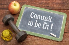 Commit to be fit - motivation concept on blackboard royalty free stock image Commit to be fit - motivation concept on blackboard royalty free stock image