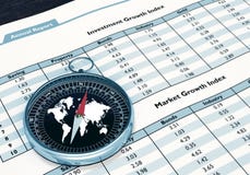 Compass And Financial Report Stock Photos