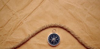 Compass And Rope On Old Paper Stock Photography