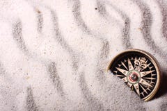 Compass In Sand Stock Image