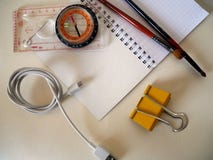 A compass and objects on a white background stock images A compass and objects on a white background stock images