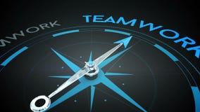 Compass pointing to teamwork