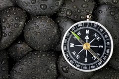 Compass With Rock Stock Photo