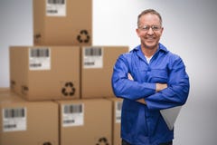 Composite 3d image of smiling warehouse manager standing with arms crossed Stock Photography Composite 3d image of smiling warehouse manager standing with arms crossed Stock Photography