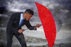 Composite image of businessman defending with red umbrella Royalty Free Stock Photo Composite image of businessman defending with red umbrella Royalty Free Stock Photo