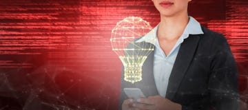 Composite image of businesswoman using mobile phone over white background stock photo Composite image of businesswoman using mobile phone over white background stock photo