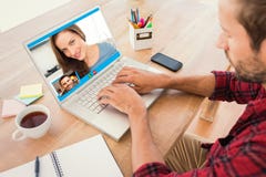 Composite image of creative businessman typing on laptop royalty free stock photography Composite image of creative businessman typing on laptop royalty free stock photography