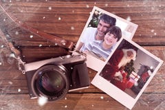 Composite image of father and son holding a christmas gift royalty free stock image Composite image of father and son holding a christmas gift royalty free stock image