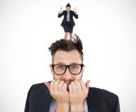 Composite image of geeky nervous businessman looking at camera Stock Photo Composite image of geeky nervous businessman looking at camera Stock Photo