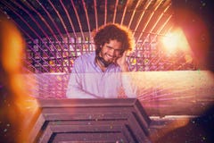Composite image of male dj playing music stock images Composite image of male dj playing music stock images