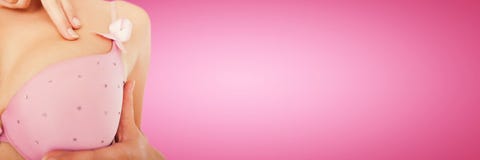 Composite image of mid section of woman wearing pink bra for breast cancer awareness royalty free stock images Composite image of mid section of woman wearing pink bra for breast cancer awareness royalty free stock images