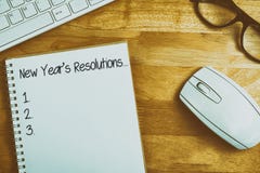 Composite image of new years resolution list. New years resolution list against overhead of notebook and glasses royalty free illustration Composite image of new years resolution list. New years resolution list against overhead of notebook and glasses royalty free illustration