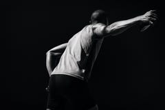Composite image of rear view of sportsman practising discus throw royalty free stock image Composite image of rear view of sportsman practising discus throw royalty free stock image