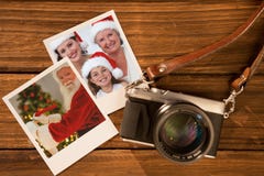Composite image of smiling santa claus writing list Stock Photos Composite image of smiling santa claus writing list Stock Photos