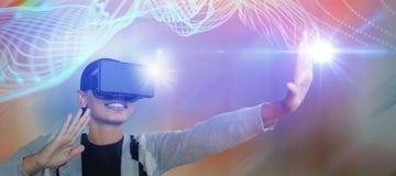 Composite image of smiling young woman gesturing while wearing virtual reality glasses stock photos Composite image of smiling young woman gesturing while wearing virtual reality glasses stock photos