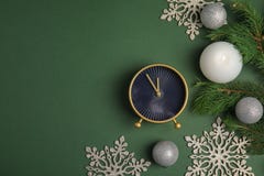 Composition with alarm clock and decorations on color background. Christmas countdown Stock Image Composition with alarm clock and decorations on color background. Christmas countdown Stock Image