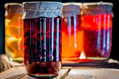 Compote of cherries in a glass jar stock photo Compote of cherries in a glass jar stock photo