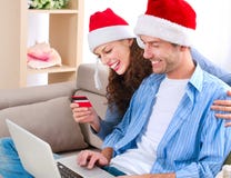 Compras en línea de la Navidad imágenes de archivo libres de regalías Compras en línea de la Navidad imágenes de archivo libres de regalías