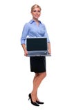 Computador portátil cheio da terra arrendada da mulher do comprimento com bla imagens de stock Computador portátil cheio da terra arrendada da mulher do comprimento com bla imagens de stock
