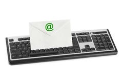 Computer keyboard and e-mail letter. Isolated on white background Royalty Free Stock Photography Computer keyboard and e-mail letter. Isolated on white background Royalty Free Stock Photography