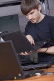 Computer technician installing software