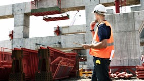 Conceito de trabalho de Construction Site Planning do arquiteto foto de stock royalty free Conceito de trabalho de Construction Site Planning do arquiteto foto de stock royalty free