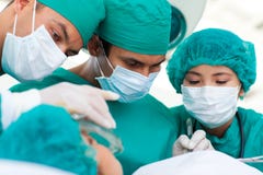 Concentrated surgeons during a surgery