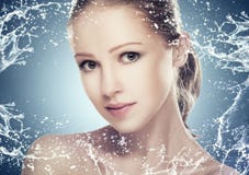 Concept beauty skin care, face of beautiful girl with splashes and water