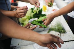 Concept of begging food : Beggar begs food from donors : concept of poverty in Asian society stock photos Concept of begging food : Beggar begs food from donors : concept of poverty in Asian society stock photos