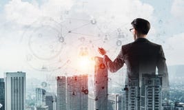 Concept of business success and control with confident boss against cityscape background stock images Concept of business success and control with confident boss against cityscape background stock images
